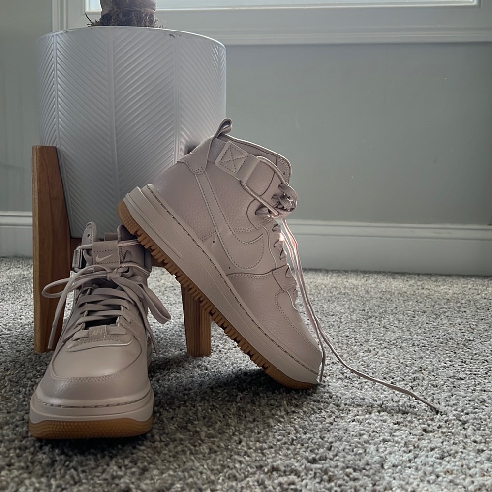 Mauve pink Nike high top 1s
